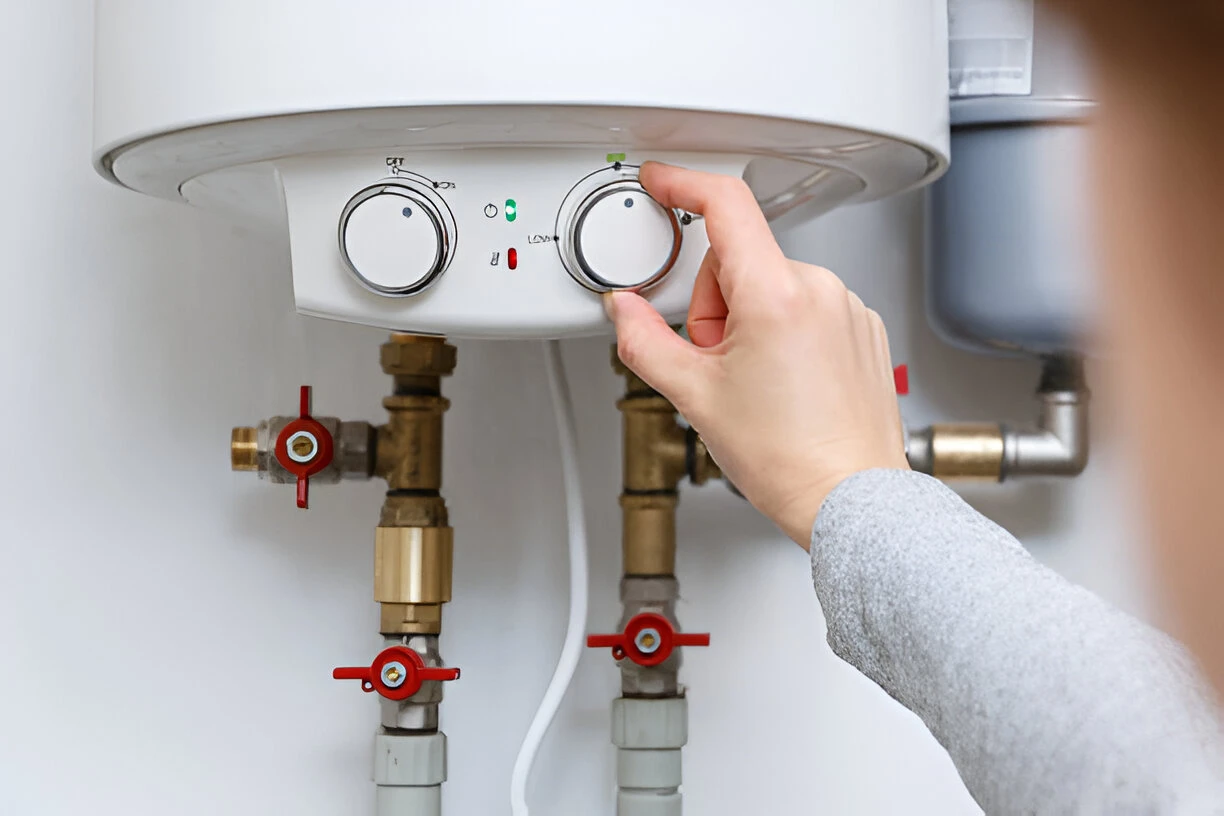 Home 15 Heating and air conditioning technician servicing unit in Palmetto, Florida